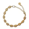 Pulsera combinada dorado
