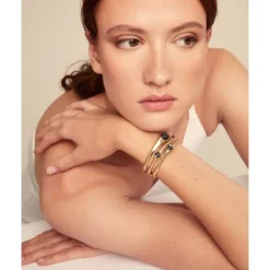Pulsera rígida bañada en oro 18k con cristales grises Uno de 50